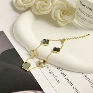 Radiant Four Petals Gold Toned Bracelet in Grey EUR628